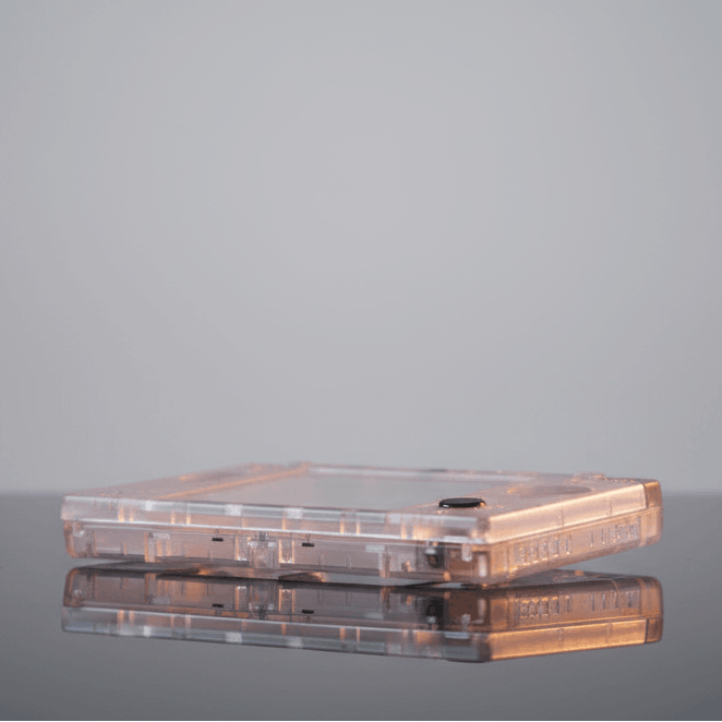 Crystal Ghost Bundle see-through DSi replacement shell shown angled on grey - ModxGaming UK