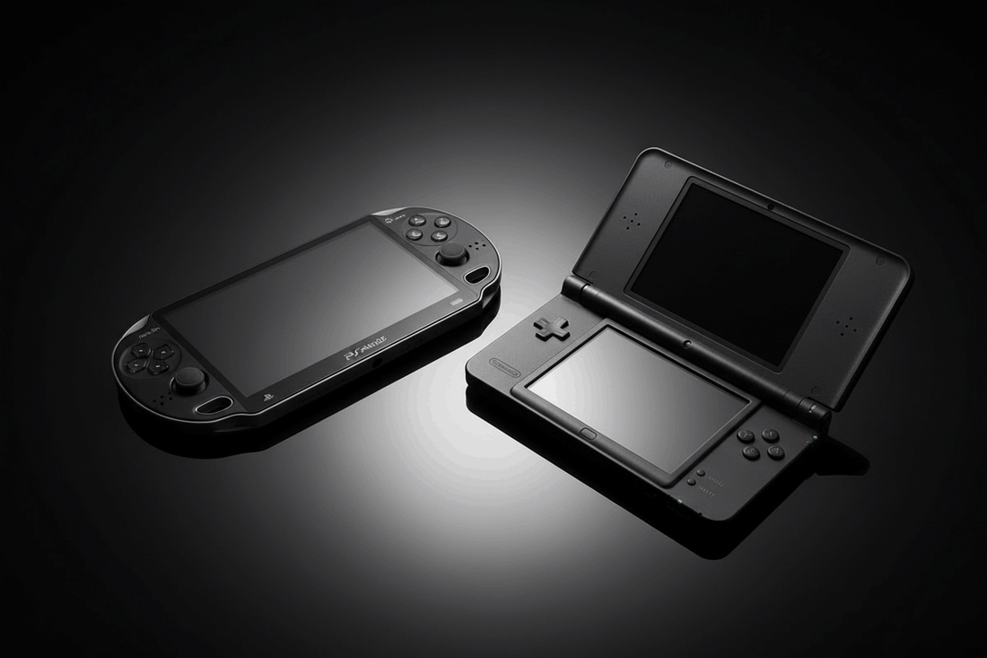 PS Vita and Nintendo DS XL on dark studio background - retro handheld gaming