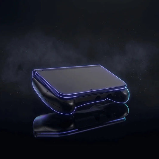 Nintendo 3DS XL in a black ergonomic hand grip on a dark studio surface with blue rim lighting – ModxGaming UK