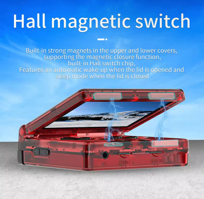 Red electronic device with open lid on a gray surface, featuring text about hall magnetic  switch.Modded Game Boy Advance SP with 64GB memory card, IPS backlit screen and custom shell – restored and upgraded handheld console.”
