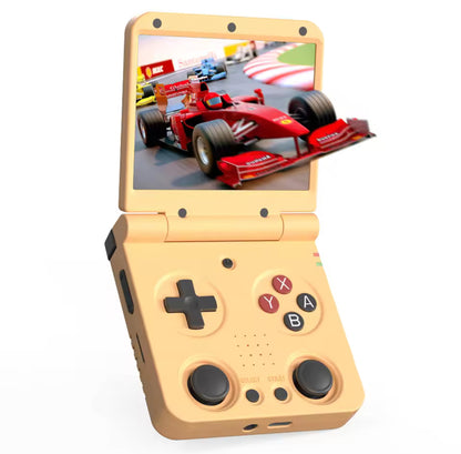 Toy-like handheld device with screen displaying a racing game on a white background MIYOO Flip V2 retro handheld gaming console with clamshell design, 3.5-inch IPS 640×480 screen, RK3566 quad-core CPU, dual analog sticks, 1GB RAM, 64GB microSD support, Wi-Fi, Bluetooth, USB-C charging, 3000mAh battery, metal hinge, and upgraded controls for multi-system emulation.