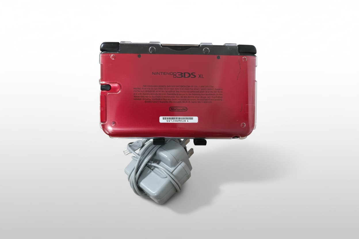 Red modified Nintendo 3DS XL with charger, Luma3DS custom firmware, and homebrew emulators
