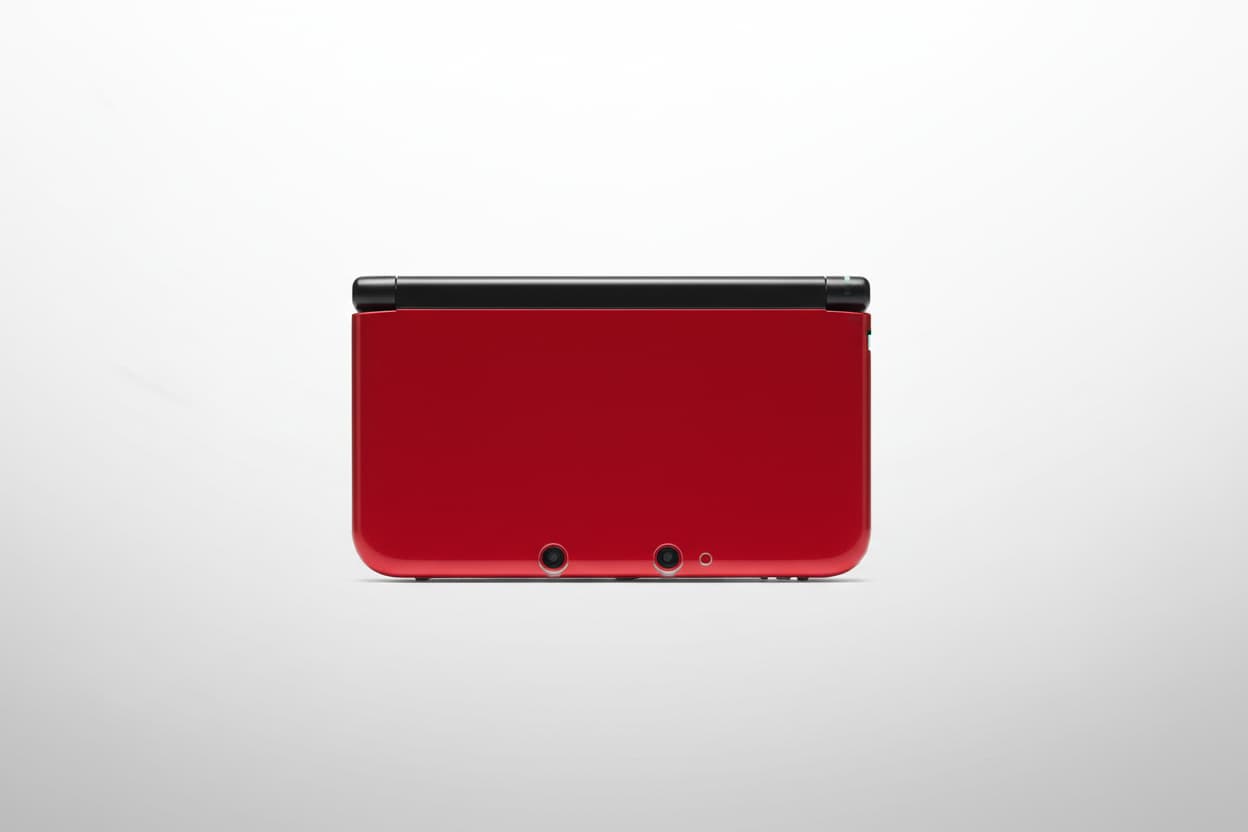 Red modified Nintendo 3DS XL with charging cable, Luma3DS custom firmware, and homebrew emulators
