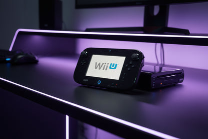 Nintendo Wii U gaming console on a dark surface with a purple glow Modded Nintendo Wii U console with custom firmware, 64GB-256GB SD card, pre-installed games and emulators