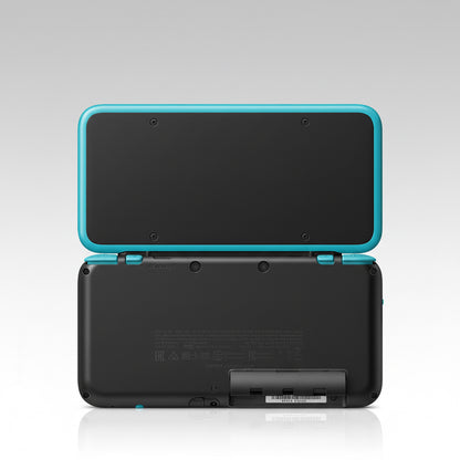 Black electronic device with turquoise top cover on a white background White handheld gaming console with dual screens on a desk with colorful lighting Modded New Nintendo 2DS XL with Luma custom firmware, 128GB SD card, emulators, homebrew apps, and pre-installed software, displayed in excellent condition for retro and 3DS gaming.