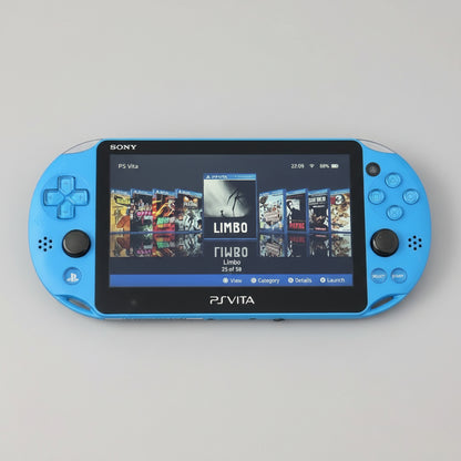 Blue Sony PS Vita gaming console on a gray background Blue Sony PS Vita portable console with custom firmware, retro emulators, pre-installed games, and 128GB SD card.