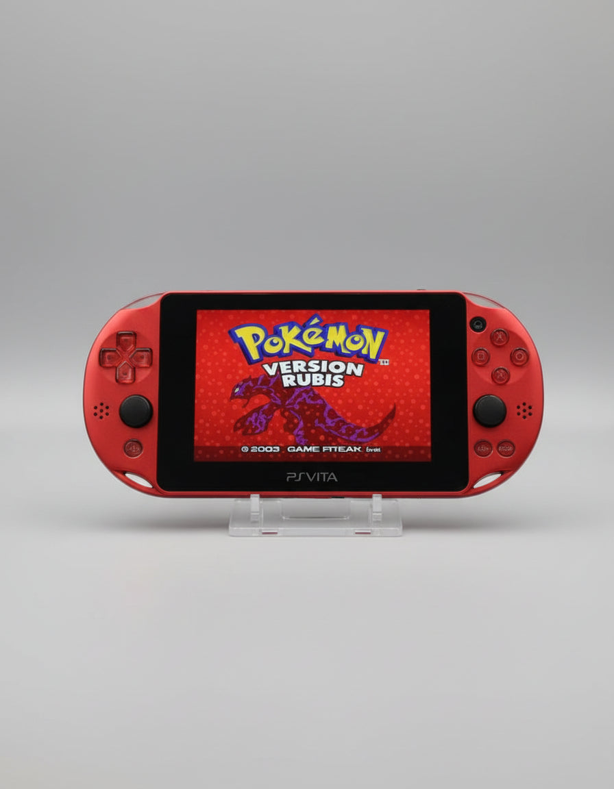 PlayStation Vita displaying 'Pokémon Version Rubis' on a dark background Blue Sony PS Vita portable console with custom firmware, retro emulators, pre-installed games, and 128GB SD card.