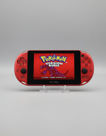 PlayStation Vita displaying 'Pokémon Version Rubis' on a dark background Blue Sony PS Vita portable console with custom firmware, retro emulators, pre-installed games, and 128GB SD card.