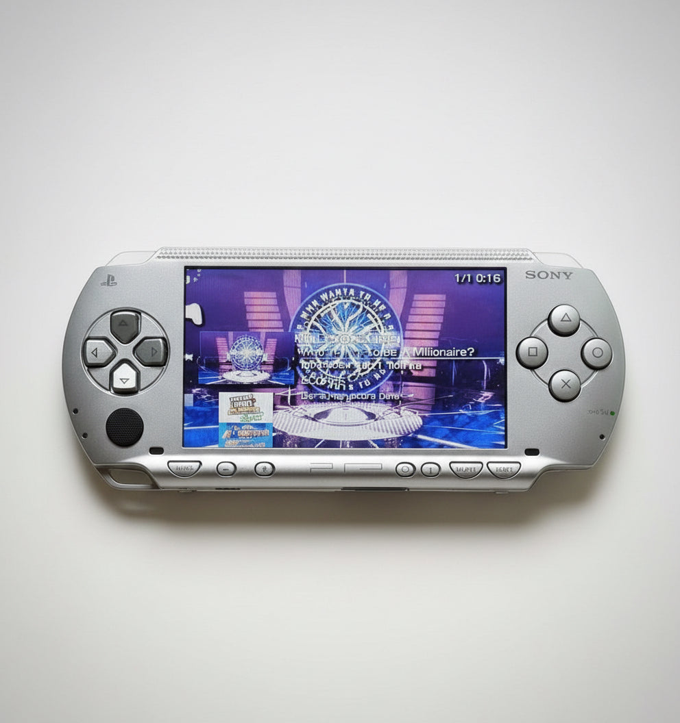 Portable gaming device with a screen displaying a game interface on a white background “Ice silver modded PSP 1000 with 128GB SD card, custom firmware, emulators and pre installed games”

“Sony PSP 1000 ice silver jailbroken console featuring 128GB storage, custom firmware and classic games”

“PSP 1000 ice silver modded handheld with custom firmware, emulator support, and 128GB SD card included”