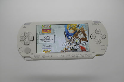 Portable gaming device with a screen displaying game graphics on a white background “Ceramic white modded PSP 1000 with 128GB SD card, custom firmware, pre installed games and retro emulators”

“Sony PSP 1000 ceramic white jailbroken handheld console, 128GB memory card, emulator and game bundle installed”

“PSP 1000 ceramic white custom firmware system with 128GB SD card, fully modded and ready to play” White modded PSP handheld with custom games - Half Minute Hero retro gaming console UK