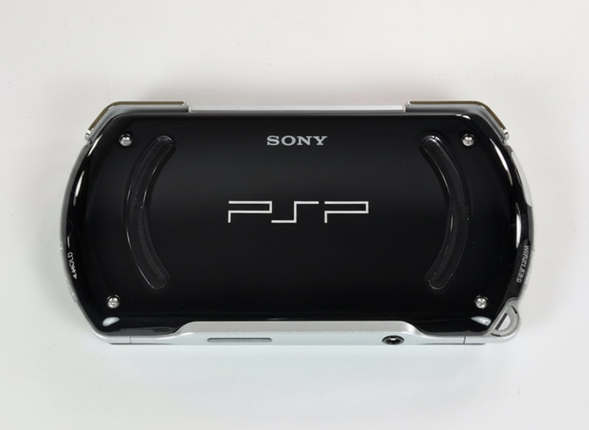 Black Sony PSP gaming console on a white background Black Sony PSP Go modded handheld console with custom firmware and emulators pre-installed, portable retro gaming system for PlayStation and classic console games