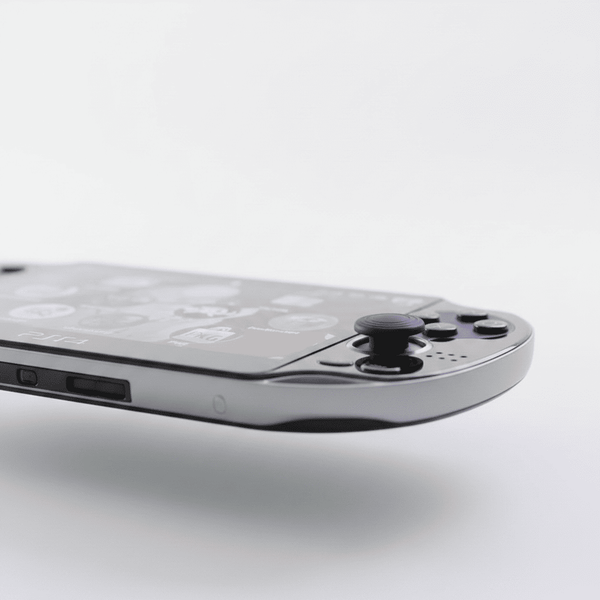 PS Vita 1000 right analogue stick and face buttons close-up detail – modded Sony handheld console by ModxGaming