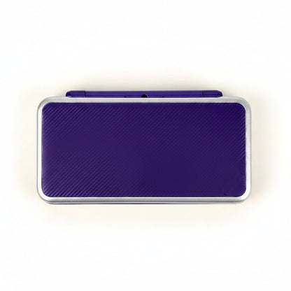 Assembled Amethyst Nebula New 2DS XL shell showing purple carbon finish and chrome silver trim