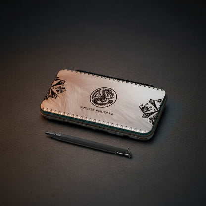 Silver marbled Astro Mist New 2DS XL housing with dragon-crest artwork on a gaming desk - ModxGaming UK