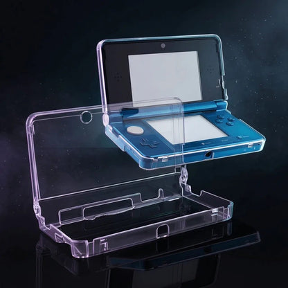 Blue Nintendo 3DS in a clear crystal hard shell case, open clamshell view on a studio backdrop – ModxGaming UK