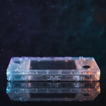 Crystal Ghost Bundle fully clear DSi replacement shell, closed transparent housing on a cosmic bg