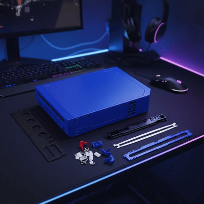 Blue Wii aftermarket housing shell on a purple RGB gaming desk with disc drive rails and clips, buy online UK