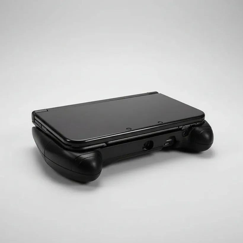 Black modded 3DS XL clipped into the ergonomic hand grip, secure bottom attachment, grip bundle UK
