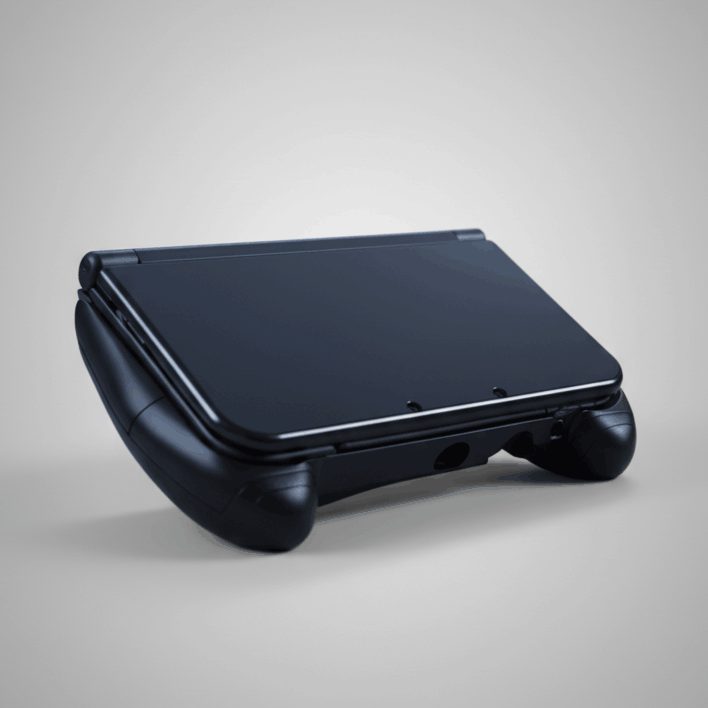 Modded 3DS XL seated in its ergonomic hand grip at an angle, comfier hold for long sessions UK