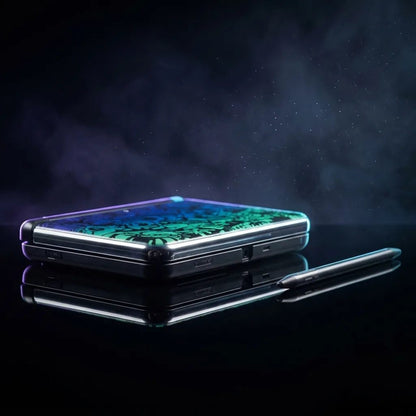 Frost Byte New 2DS XL replacement shell in black with a green and teal marbled frost lid design