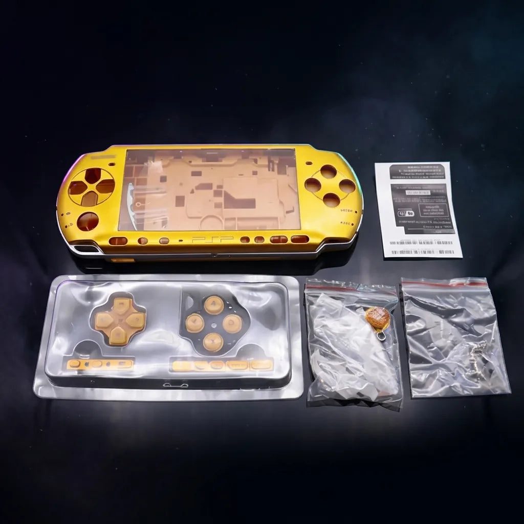 Gold PSP 2000/3000 Slim replacement shell kit laid out with buttons and screws, modded PSP housing UK