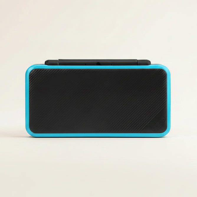 Assembled Hyper Flux New 2DS XL shell in black carbon finish with a bright cyan trim, front view