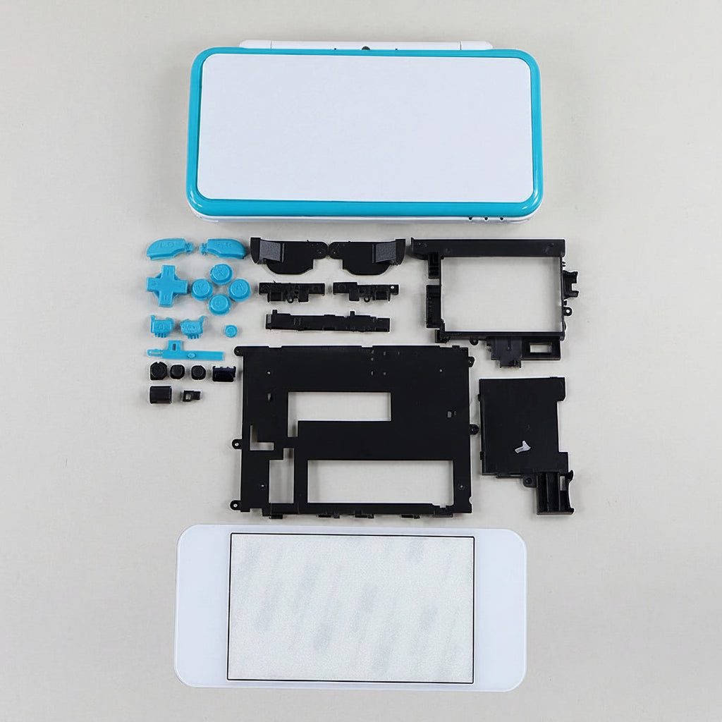Laser Fade New 2DS XL shell kit laid flat with teal buttons and white housing panels