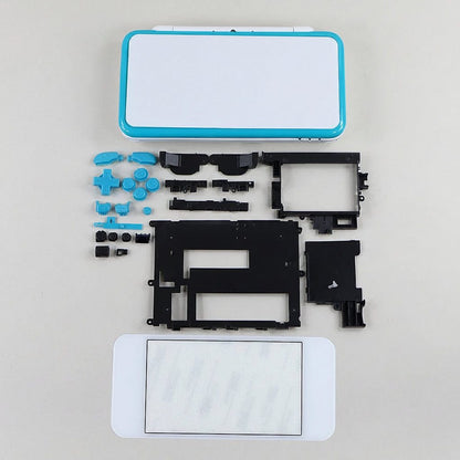 Laser Fade New 2DS XL shell kit laid flat with teal buttons and white housing panels
