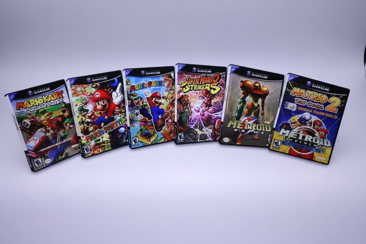 Collection of GameCube games on a white background Modded Nintendo Wii gaming setup with custom firmware emulators and pre-installed retro games on 64GB 128GB 256GB SD card