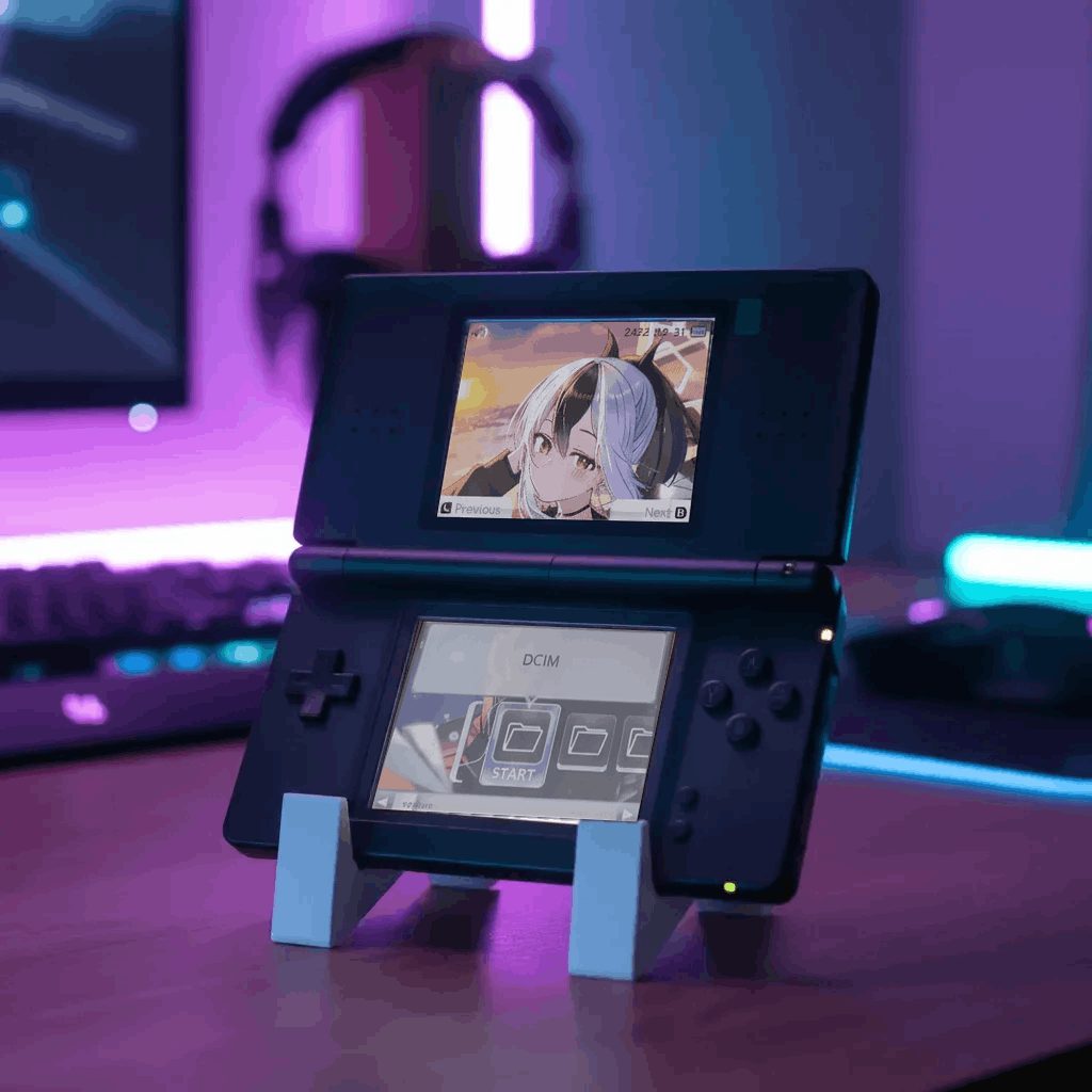 Black modded DS Lite in a neon-lit RGB gaming setup, custom firmware handheld with preloaded games – ModxGaming UK