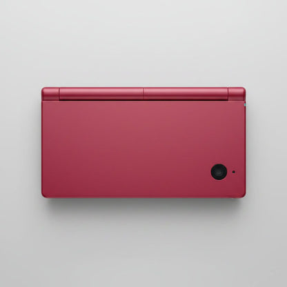 Neon Blossom DSi replacement shell shown top-down on grey, vivid crimson-pink console housing