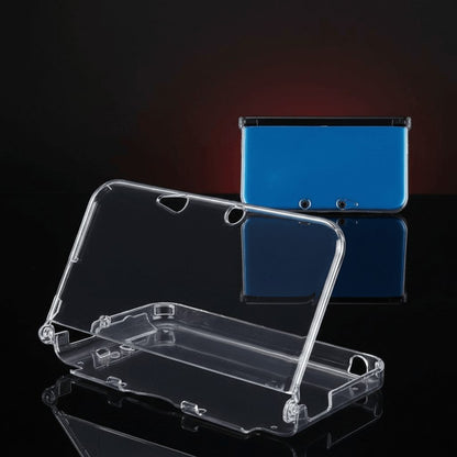 Blue Nintendo 3DS XL beside its clear crystal hard shell protective case, slim scratch-proof fit, buy online UK