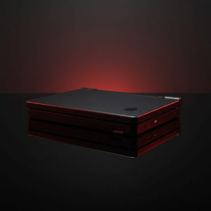 Black Nova Shift DSi housing with a red trim line lit by a horizon glow, modded Nintendo DSi shell