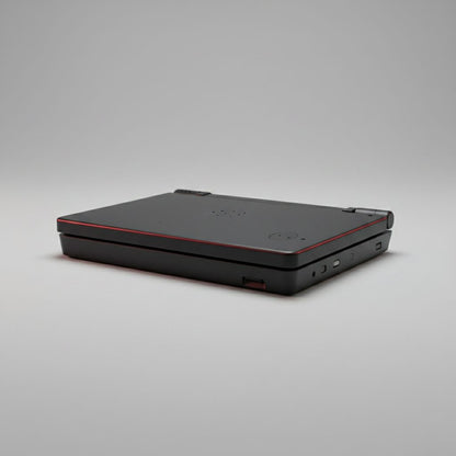 Nova Shift DSi shell in stealth black with red accents shown angled on grey - ModxGaming UK