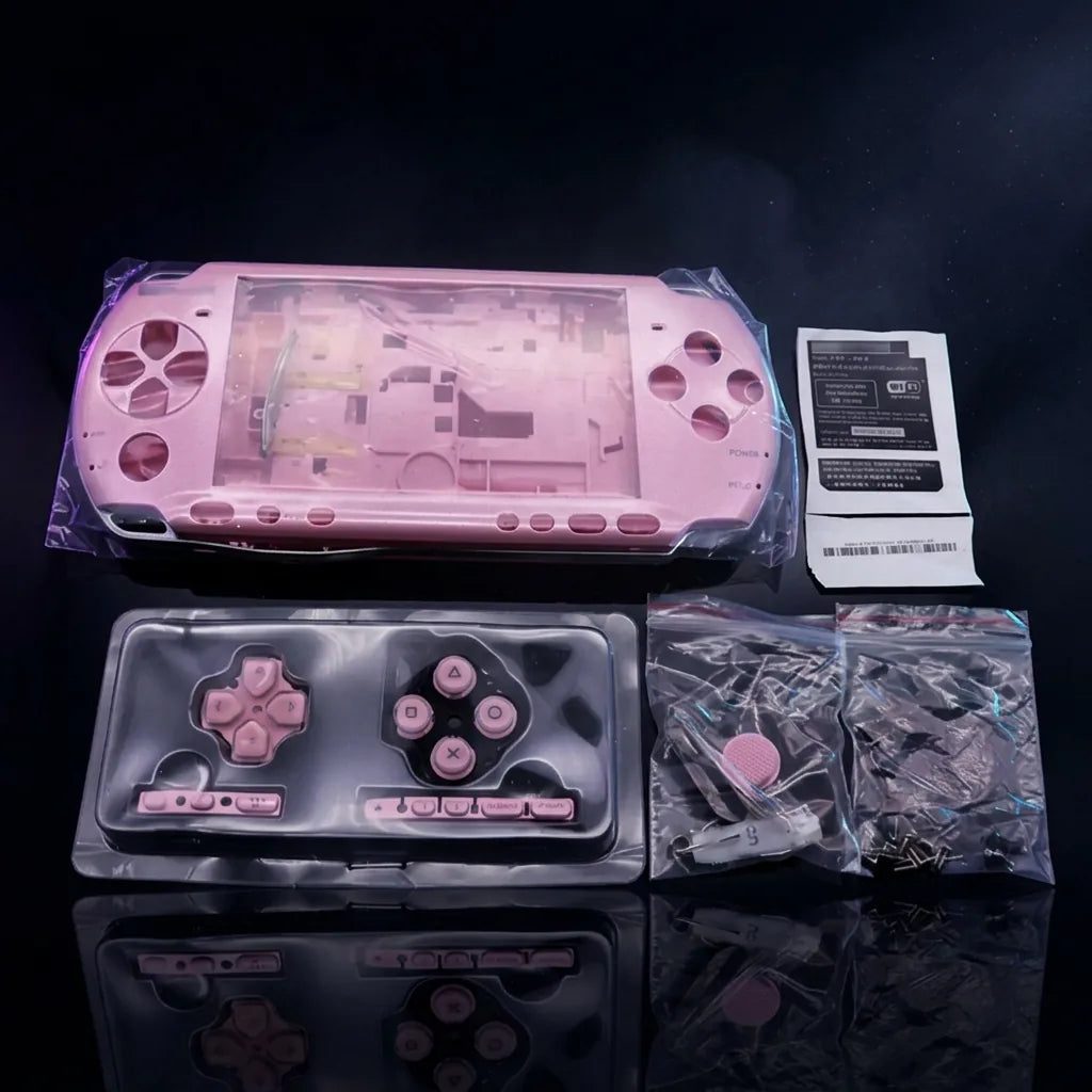 Pink PSP 2000/3000 Slim replacement shell kit laid out with buttons and screws, modded PSP housing UK