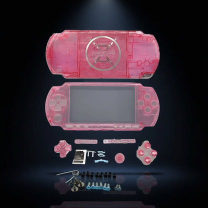 Transparent pink PSP 3000 replacement shell kit with matching buttons, screws and installation parts