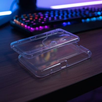 Crystal-clear Slime Surge New 2DS XL housing catching RGB light on a gaming desk - ModxGaming UK