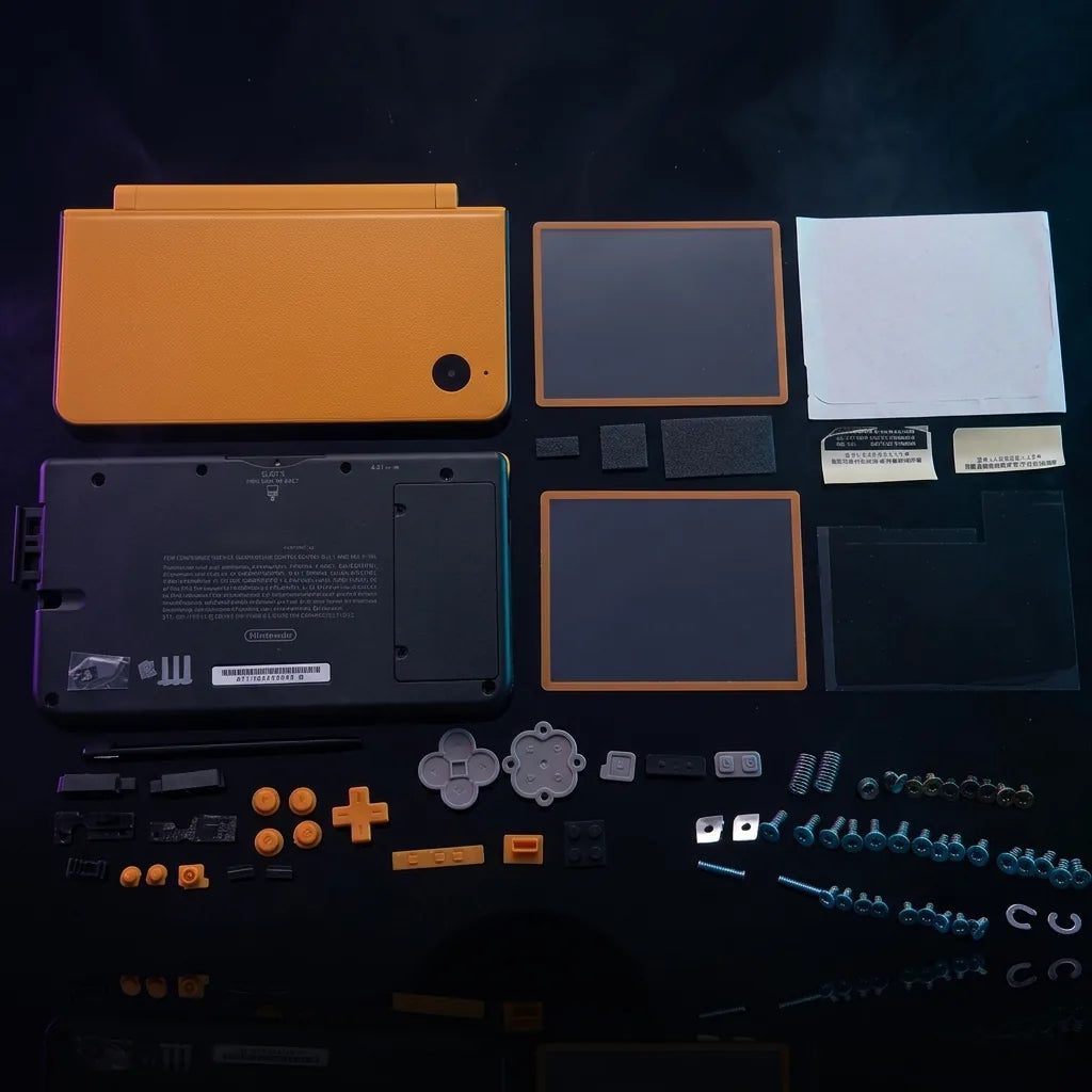 Orange yellow Nintendo DSi XL replacement shell kit with buttons and lenses on a dark studio background, ModxGaming UK